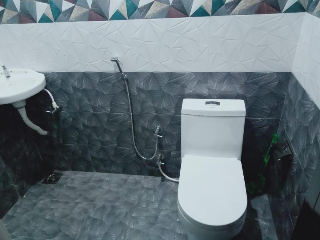 Karma Homestay Mundrothuruth Chambre photo